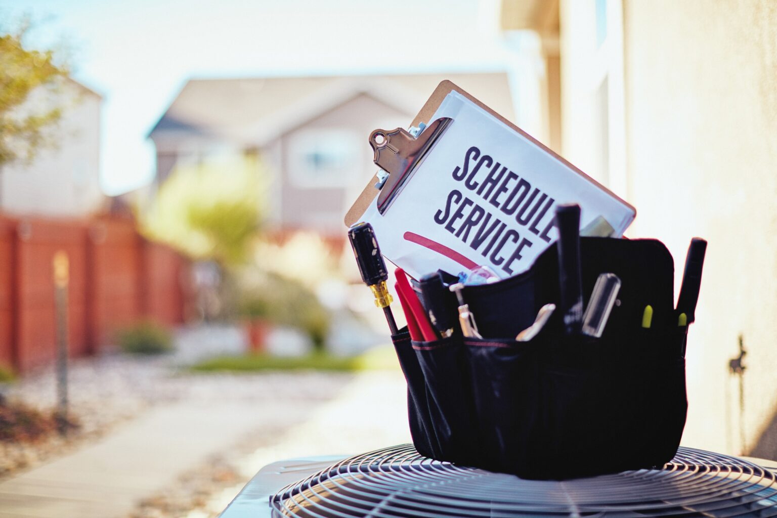 Scheduled service reminder with contact details for Zach Heating & Cooling.